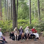 Wild Church attendees in the forest setting