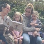 Jacqueline reading to the grandkids